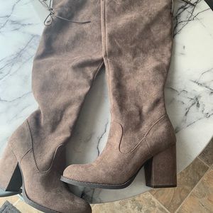 Thigh high brown boots